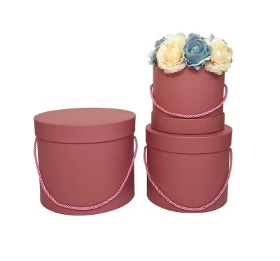 China Gift & Luxury Round Craft Cardboard Cylinder Rose Gift Packaging Pink Paper Tube Lid Flower Box for sale