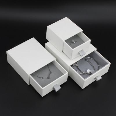 China Jewelry Package Custom Design Jewelry Packaging Ring Earring Bracelet Cardboard Jewelry Boxes With Logo for sale