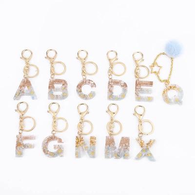 China New Design Fashion Ocean Plastic 26 Alphabet Key Rings Environmental Friendly Resin English Letter Acrylic Key Chains for sale