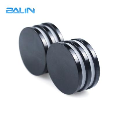 China Industrial Rare Earth Magnet N52 Large Round Strong Epoxy Coating Color Black Magnet for sale