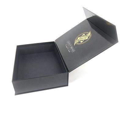 China Custom Luxury Black Gold Foil Magnet Flip Cosmetic Box Kraft Paper Gift Boxes for sale