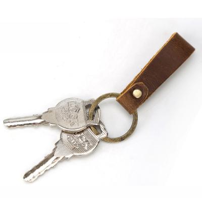 China Luxury Custom Logo Luxury Genuine Leather Hang Rope Key Chain For Real Estate for sale