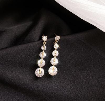 China CLASSIC silver S925 needle luminous zircon earrings for women streamlined to face thin tassel earrings for sale