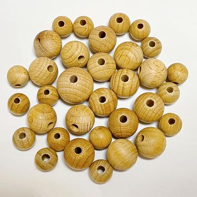 China Wholesale Eco-Friendly Natural Round 10-30mm Wooden Teether Bead Keychains Custom Hexagon Wooden Beads For Jewelry Making for sale