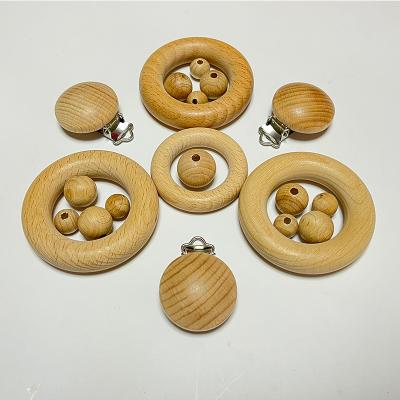 China Wholesale Eco-Friendly Bulk Natural Wooden Chewable Beads Beech Wood 10-20mm Round Beads For Jewelry Necklace Making for sale