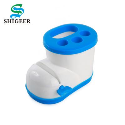 China Sustainable Fashion Customized Shoes Shape Plastic Bathroom Toothbrush Holder for sale