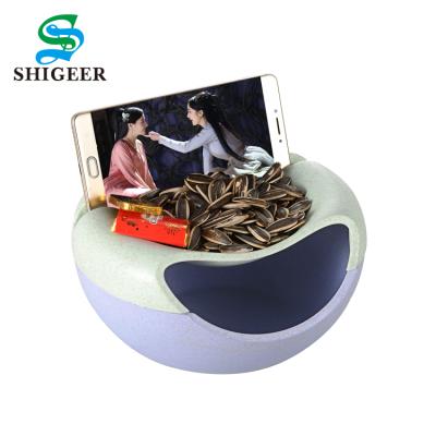 China Viable Popular Custom Multifunctional Wheat Straw Lazy Candy Dishes Dry Food Tray With Phone Holder for sale