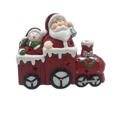 China Europe Custom Factory Dolomite Ceramic Santa Snowman Driving Train Design For Christmas Decoration for sale