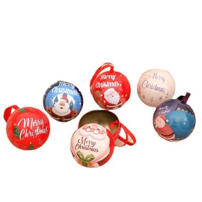 China Eco-friendly Christmas Transparent Ball Candy Boxes Romantic Design Christmas Decorations Metal Ball Can Open Plastic Bauble Ornament for sale