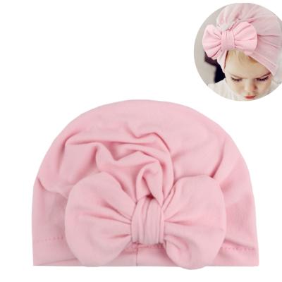 China Unisex hot sale baby headwear dobby headbands bow knot for children's hat sleeve cap turban hats for sale