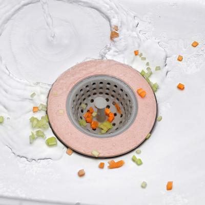 China Stocked Durable Kitchen Serving Instruments Silicone Kitchen Sink Strainer for sale