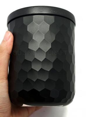 China Eco-friendly hand carved unique matte black fishscale glass candle holder with black lid candle jar for sale