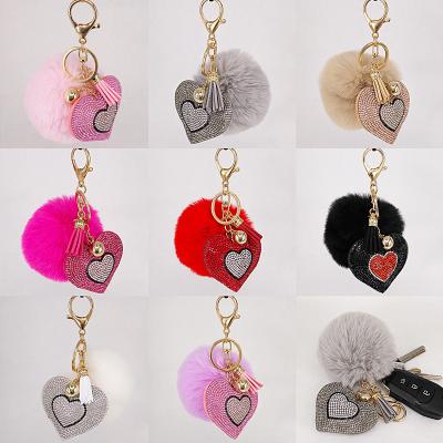 China Eco-Friendly Wholesale Cute Heart Bag Crystal Puff Keychains Custom Fluffy Key Chain Accessories for sale