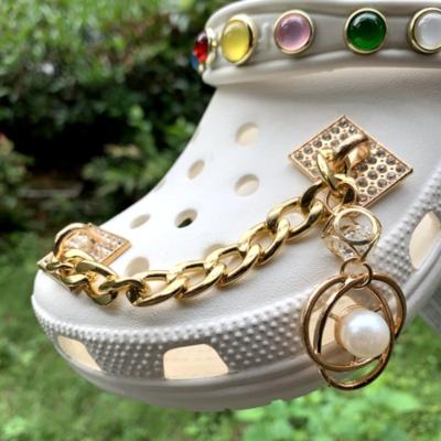 China Croc Charms Croc Designer DIY Brand Luxury Brand Shoe Chains Charms For Fashion Vintage Clogs Shoes Chains Accessories Stylish New for sale