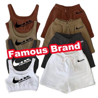 China Custom Brand LOGO Two Piece Sport Jogger Solid White Anti-Wrinkle Teams Summer Sportswear Set Tank Tops And Biker Shorts Sets For Women for sale