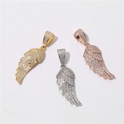 China Hiphop Flying Bird Wings Shiny Zircon Hip Hop Pendant for sale