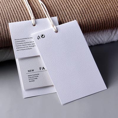 China Custom Recyled Logo Printing Paper Product Tag Swing Hang Tags Clothing Label Clothes Label Card With Logo for sale