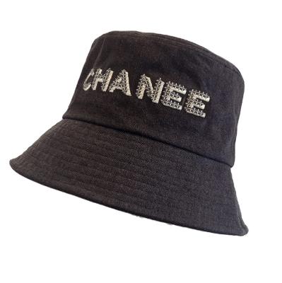 China Picture Fashion Design The Correct English Cotton Vintage 100% Wide Brim Letter Embroidery Bucket Hat for sale