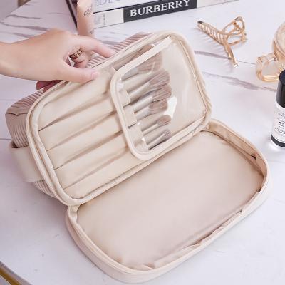 China Fashion Custom Girls Beige Cosmetic Make Up Brush Bags Large Travel Toiletry Bag With Brush Compartment for sale