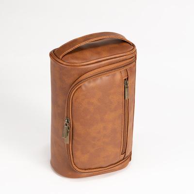 China Wholesale Fashion Retro Fashion Travel Cosmetic Pouch Storage Bag Brown Solid Color PU Leather Toiletry Bag For Men for sale