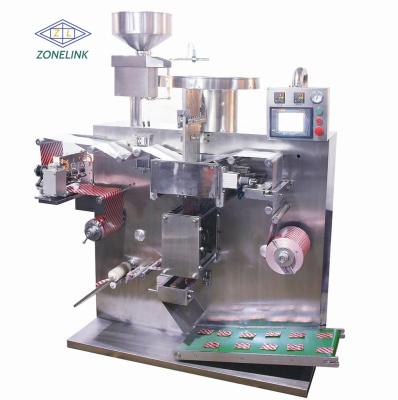 China Special Used serie automática de doble tira de aluminio caramelos de alimentos máquina de hacer ampollas máquina de embalaje dos líneas en venta