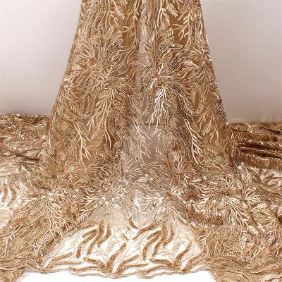 China Memory Wholesales Luxury Embroidery Beading Sequins Lace Up Fabric For Bridal Dress for sale