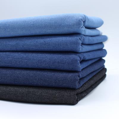 China Breathable Stretch Stock Lot Colored Polyester Cotton Jeans Fabrics Denim Fabric for sale