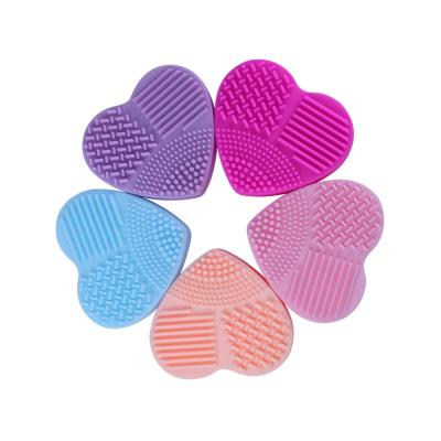 China Multicolor Heart Shaped Complexion Silicone Brush Deep Cleansing And Brightening Cosmetic Cleansing Pad For Effective Facial Cleansing for sale