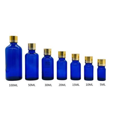 China New Hot Sale 5ml/10ml/15ml/20ml/30ml/50ml/100ml Skin Care/Health Blue Essential Oil Glass Bottle For Beauty And Personal Skin Care for sale