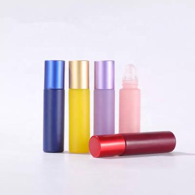 China 10ml Macaron Crystals Ball Essential Oil Bottle Perfume Cosmetic Roll On Glass Bottles for sale