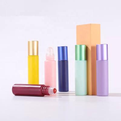 China Rainbow Color Pink 5ml Essential Oil Or Cosmetic Roll On Glass Perfume Roller Making Bottle for sale