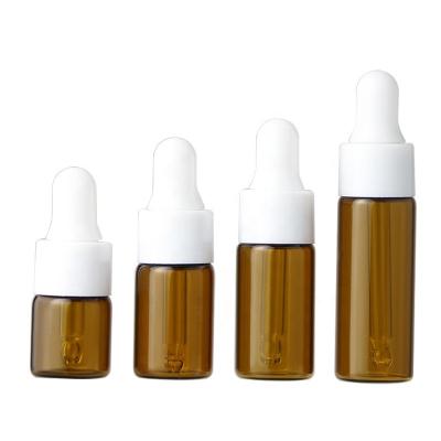 China Personal Care Mini Essential Oil Sample Clear Amber Glass Dropper Bottle Glass Essential Oil Cosmetic Products Screen Printing for sale