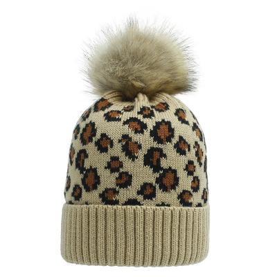 China COMMON Knit Beanie Warm Caps Hats Leopard Hat Luxury With Pom Pom Ball for sale