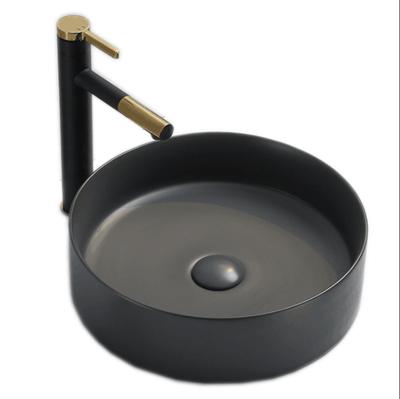 China Matte Black Single Sink Creative Hotel Basin Solid Resin Bathroom Outdoor Washbasin for sale