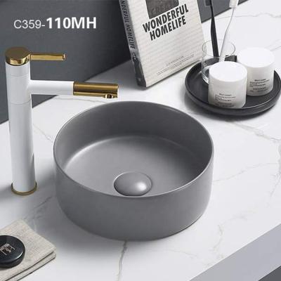 China Latest Eco - Friendly Gray Small Ceramic Art Washing Basin Sink For Bathroom for sale