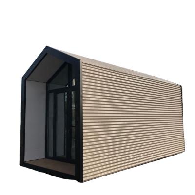 China Modern luxury natural sloping roof log house prefab restort industrial steel structure building shed cabin mobile homes for sale