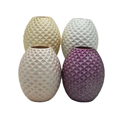 China Art Decor Porcelain Vase Silver Ceramic Makers Creative Egg Pebble Vases for Decor Home and Artificial Flower for sale