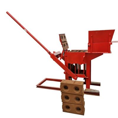 China Building Material Stores Hand Press Manual Small Clay Interlocking Brick Making Machine Made In China for sale