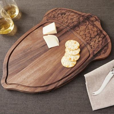 China Creative Viable Irregular Wooden Chopping Board Kitchen Cheese Nut Shaped Cutting Boards Wooden Chopping Board With Customo Logo for sale