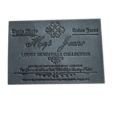 China Viable Wholesale Promotional Fashion Labels Embossed Flower On PU Leather Label With Custom Logo Label For Jeans And Jackets for sale