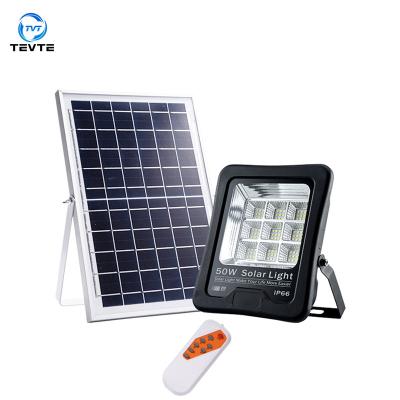 China Good quality solar garden flood light ip66 with automatic power storage led solar panel for garden lawn camping for sale