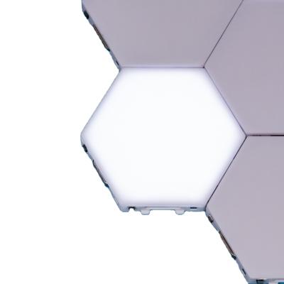 China DIY Hexagons Wall Light Finger Touch Led Light Magnetic Modular Sensitive HEX LED Touch Control Honeycomb Night Light For Decoration for sale