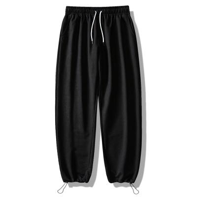 China Breathable Wholesale Custom White Drawstring Casual Sports Wear Anorak Track Pants For Men for sale