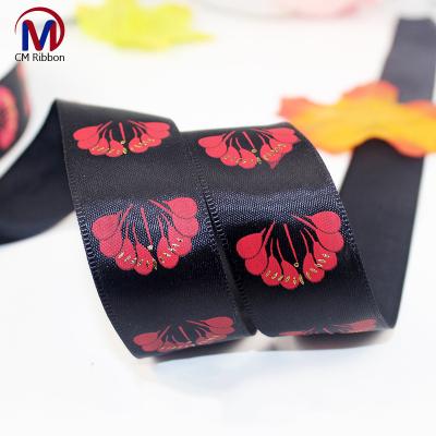 China Viable Manufacturers Custom Ribbon in 2.5cm Gift Box Black Ink Custom Logo Silk Ribbon for sale