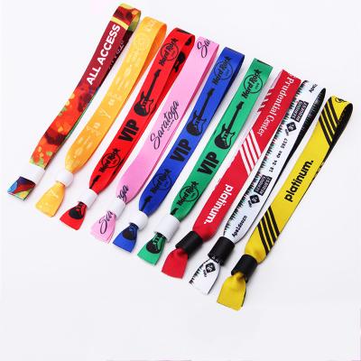 China Durable Custom Color Heat Sublimation Printing Double Sided Wrist Straps Locks Fabric Wrist Bands for sale