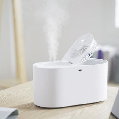 China Multifunctional Creative Design Fan Humidifier + Mini Fan Design Mist Sprayer Humidifier Desktop Table Fans for sale