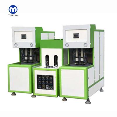 China Semi Automatic Bottle China Manual 4 Cavity Bottle Blowing Machine For Making Plastic PP/PET Bottles Low Price for sale