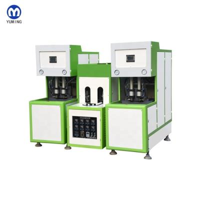 China YM-2000-B semi automatic bottle blowing machine for making PET/PP small plastic bottle. for sale