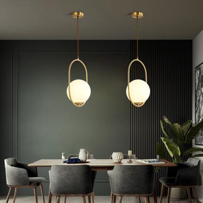 China Modern Simple Atmosphere Art Design Round Glass All Metal Copper Chandelier for sale