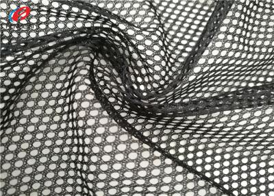 Chine Grand tissu de maille de vêtements de sport de noir de trou, tissu sportif étiré d'habillement à vendre